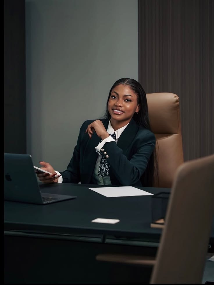 Executive portrait of a woman seated in an office
